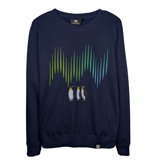 Front view of a navy Zoobotanic Unisex Emperor Penguin Z02 heavyweight fleece sweatshirt. Where designs call nature to mind, it features a detailed illustration of three emperor penguins standing beneath vibrant green and blue vertical aurora light bands.