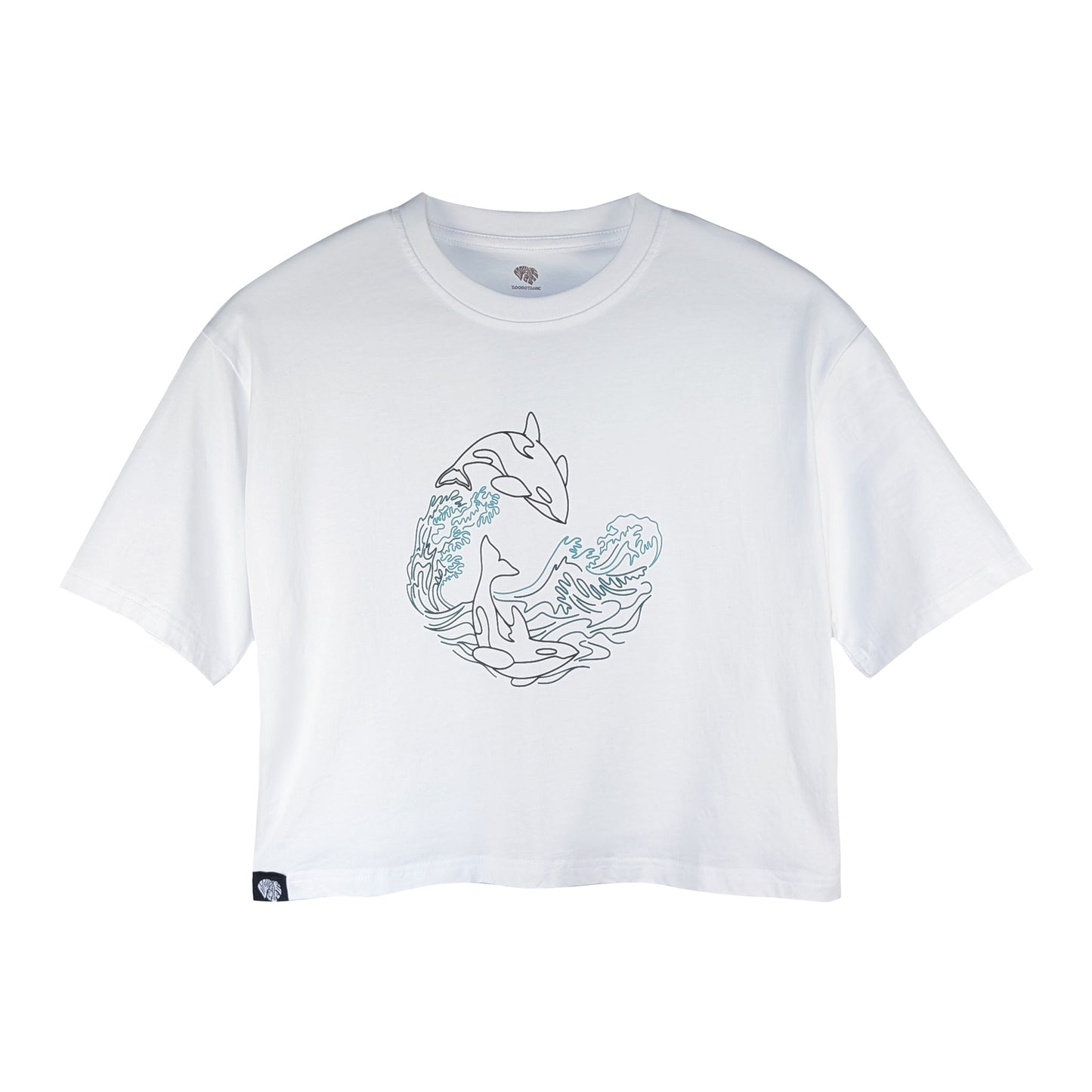 Front view of a white Zoobotanic Women's Orca Whale Z08 short-sleeved cropped t-shirt. Where designs call nature to mind, it features a relaxed cut. A line-art rubber print depicts an orca whale leaping through cresting ocean waves.