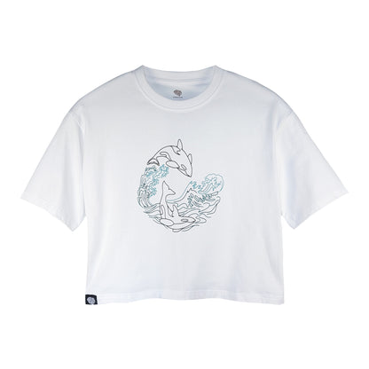 Front view of a white Zoobotanic Women's Orca Whale Z08 short-sleeved cropped t-shirt. Where designs call nature to mind, it features a relaxed cut. A line-art rubber print depicts an orca whale leaping through cresting ocean waves.